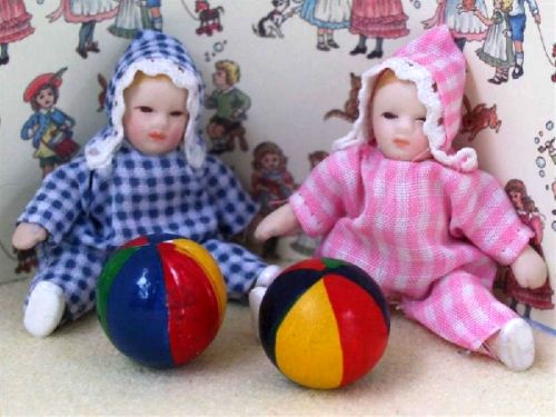 Doll - Baby In Checked Baby Grow